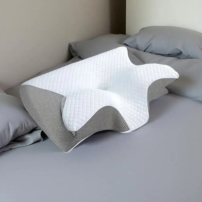 Contoured design of orthopedic pillow — cradles head and neck for perfect alignment