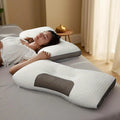 Woman sleeping comfortably on orthopedic memory foam neck pillow for neck pain relief